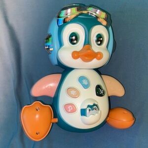 Interactive Penguin Toy with Lights and Sounds